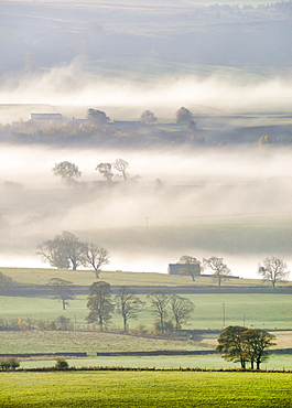 Mist rising over East Halton and Embsay in Lower Wharfedale, North Yorkshire, Yorkshire, England, United Kingdom, Europe