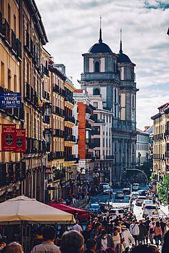 Pedestrians in a busy Calle Toledo in Central Madrid, Spain, Europe