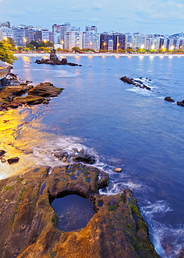 Twilight view towards Icarai Beach with skyline of Niteroi, Niteroi, Rio de Janeiro, Brazil, South America