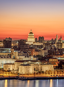 View over Castle of the Royal Force (Castillo de la Real Fuerza) and Habana Vieja towards El Capitolio at dusk, UNESCO World Heritage Site, Havana, La Habana Province, Cuba, West Indies, Central America