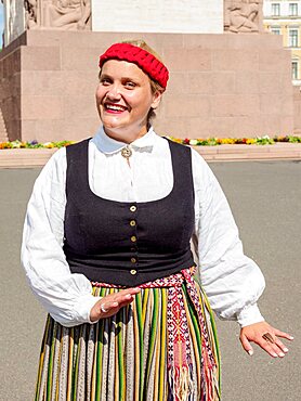 Lady in traditional clothing, Freedom Square, Riga, Latvia