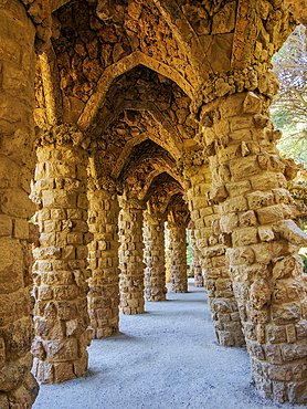 Colonnaded footpath under the roadway viaduct, Park Guell, UNESCO World Heritage Site, Barcelona, Catalonia, Spain, Europe