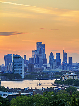 View over River Thames towards The City at dusk, London, England, United Kingdom, Europe