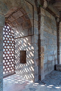 The intricate window carvings provide beautiful shadows at Qutub Minar, UNESCO World Heritage Site, New Delhi, India, Asia