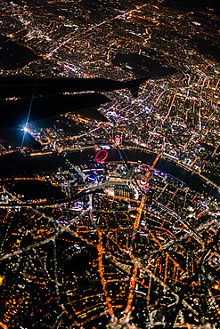 View over London at night from an airplane window, London, England, United Kingdom, Europe