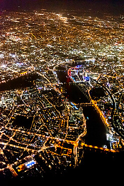 View over London at night from an airplane window, London, England, United Kingdom, Europe