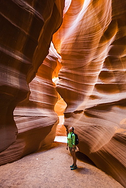 Girl visiting Upper Antelope Canyon, Navajo Tribal Park, Arizona, United States of America, North America