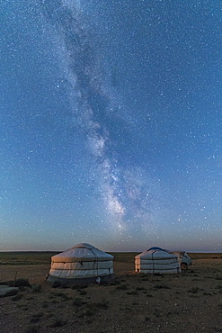 Mongolian traditional gers under the Milky Way, Ulziit, Middle Gobi province, Mongolia, Central Asia, Asia