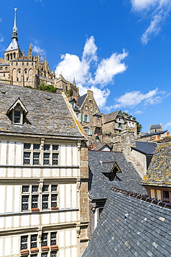 Houses in the village centre with the Abbey above, UNESCO World Heritage Site, Mont-Saint-Michel, Normandy, France, Europe