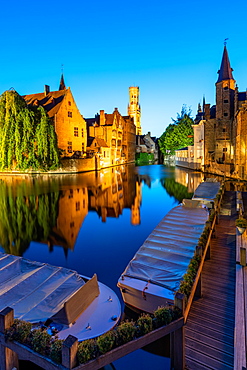 The beautiful buildings of Bruges reflected in the still waters of the canal, UNESCO World Heritage Site, Bruges, Belgium, Europe