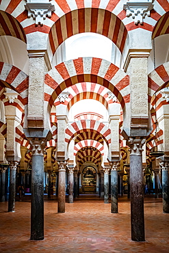 The red and white stone Arches of Mezquita de Cordoba (Great Mosque) (Cordoba Cathedral), UNESCO World Heritage Site, Cordoba, Andalusia, Spain, Europe