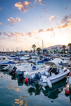 Boats at sunset at Benalmadena Puerto Marina between the Costa Del Sol beach resorts of Benalmadena and Torremolinos, Andalusia, Spain, Europe