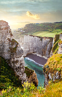 Les Falaises (cliffs) of Etretat at sunrise, Etretat, Normandy, France, Europe