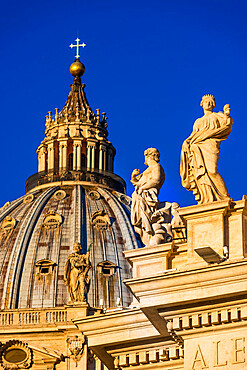 St. Peter's Basilica Cupola and statues in early morning light, Vatican City, Rome, Lazio, Italy, Europe