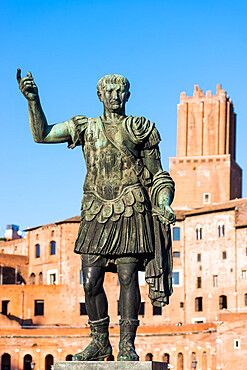 Statue of the Emperor Trajan with Trajan's Forum and market to the rear, Rome, Lazio, Italy, Europe