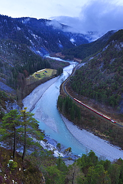 Transit of the Red Train in the gorge, Rhein Gorge (Ruinaulta), Flims, Imboden, Graubunden, Switzerland, Europe