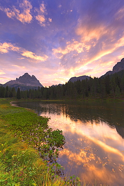 Three Peaks of Lavaredo reflected in the Antorno Lake during sunrise, Sesto Dolomites, Belluno Province, Veneto, Italy, Europe