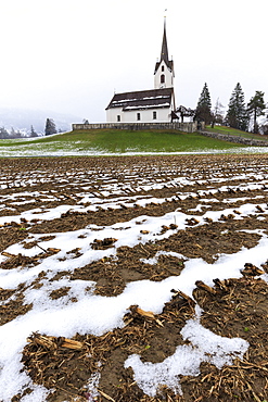 Fields ploughed in front of the church, Versam, Safiental, Surselva, Graubunden, Switzerland, Europe