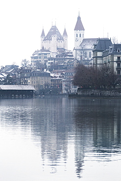 Old city of Thun is reflected in the Aare River, Thun, Canton of Bern, Switzerland, Europe