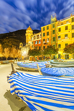 Traditional boats with the church of Vernazza in the background, Cinque Terre, UNESCO World Heritage Site, Liguria, Italy, Europe