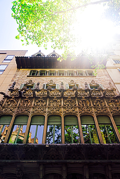 Palau del Baro de Quadras, Modernist palace by architect Josep Puig, with facade featuring Gothic amd Arabesque-inspired design in Barcelona, Catalonia, Spain, Europe