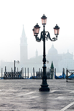 Lamp and St. Mark's Square with Grand Canal and Church of San Giorgio Maggiore in the background, Venice, UNESCO World Heritage Site, Veneto, Italy, Europe