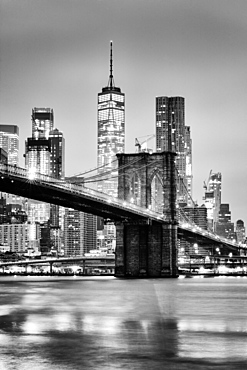 Brooklyn Bridge with 1 World Trade Centre in the background. New York City, New York, United States of America, North America