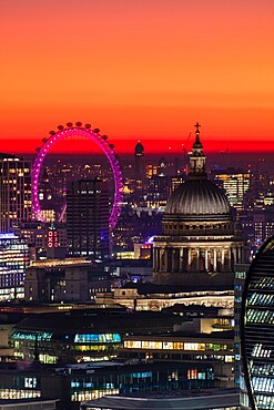 Aerial view of London skyline at sunset, including London Eye and St. Paul's Cathedral, London, England, United Kingdom, Europe