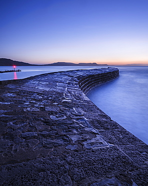 The harbour wall known as The Cobb in Lyme Regis, Dorset, England, United Kingdom, Europe