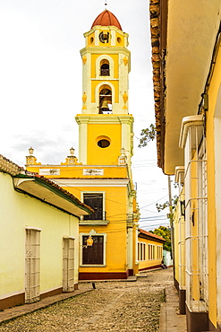 A view from Plaza Major towards the bell tower of the Convent of San Francisco, Trinidad, UNESCO World Heritage Site, Cuba, West Indies, Caribbean, Central America