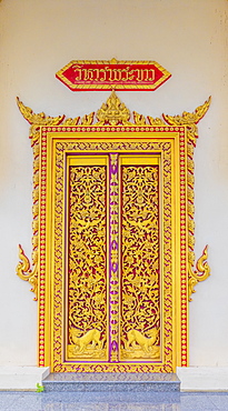 An ornate temple door at the Office of National Buddhism, in Phuket Town, Phuket, Thailand, Southeast Asia, Asia