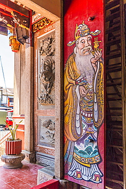 An ornate colourful door at Eng Chuan Tong Tan Kongsi clan house in George Town, Penang Island, Malaysia, Southeast Asia, Asia