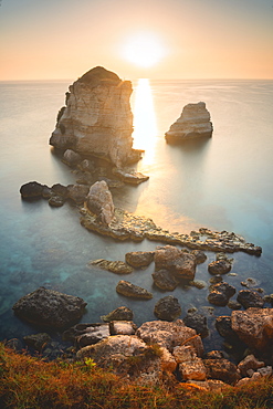 Sunrise at the Faraglioni of Torre dell'Orso, Meledugno, Lecce province, Apulia, Italy, Europe