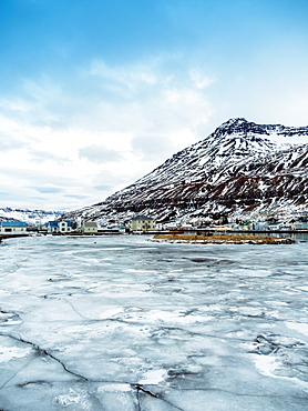 Seyoisfjorour city in winter before sunrise with ice frozen, Eastern region, Iceland, Polar Regions