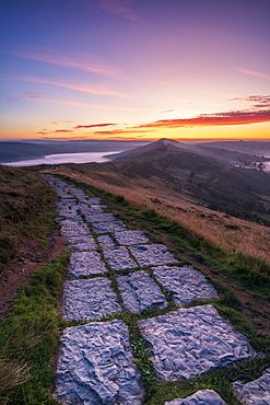 Limestone path leading to Lose Hill and Back Tor from Mam Tor with amazing sunrise, The Peak District National Park, Derbyshire, England, United Kingdom, Europe