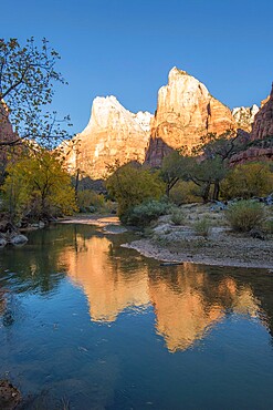 Abraham and Isaac Peaks reflected in the Virgin River at sunrise, autumn, Court of the Patriarchs, Zion National Park, Utah, United States of America, North America