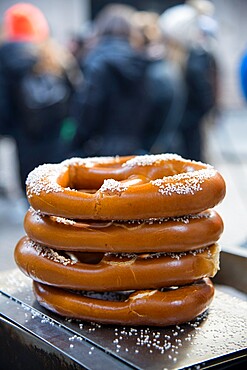 Pile of salty pretzels for sale at a street vendor stall in New York City, New York, United States of America, North America