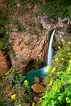 Waterfall near historic bridge of Ronda in Pueblos Blancos region, Andalusia, Spain, Europe