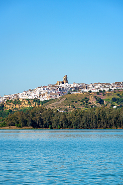 Arcos de la Frontera view from the other side of the lake in the Pueblos Blancos region, Andalusia, Spain, Europe