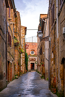 Pitigliano historic village street in Tuscany, Italy