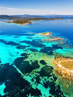 Diaporos island and Karydi beach with turquoise water drone aerial view, in Greece