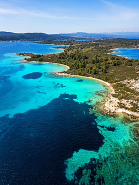 Diaporos island with wild beaches with turquoise water drone aerial view in Greece