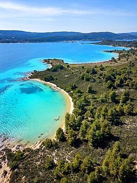 Diaporos island with wild beaches with turquoise water drone aerial view in Greece