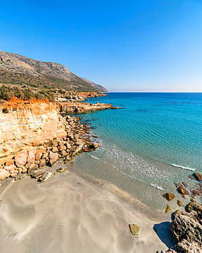 Petrified forest Agia Marina Agios Nikolaos Geopark beach with turquoise water in the south of Greece