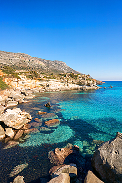 Petrified forest Agia Marina Agios Nikolaos Geopark beach with turquoise water in the south of Greece