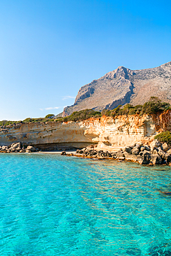 Petrified forest Agia Marina Agios Nikolaos Geopark beach with turquoise water in the south of Greece