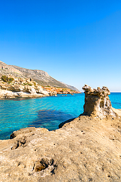 Petrified forest Agia Marina Agios Nikolaos Geopark beach with turquoise water in the south of Greece