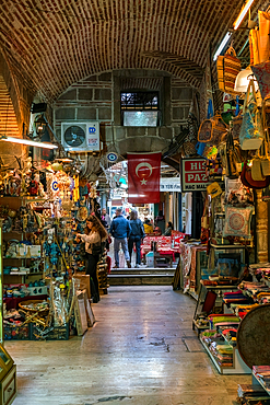 Street inside Izmir Kemeralti bazaar market full with souvenir shops in Turkey