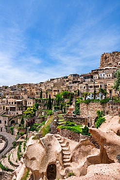 Uchisar town with traditional houses in Cappadocia, Turkey