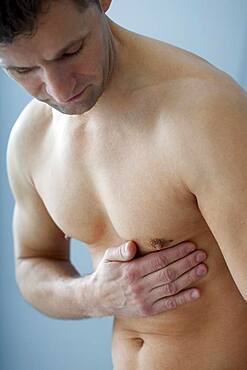 Man with rib pain